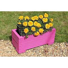 Pink wooden garden trough planter veg bed flower plant pots in decking boards